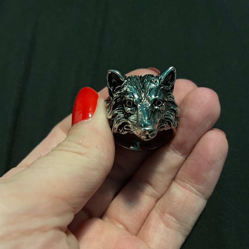 Metal wolf ring.